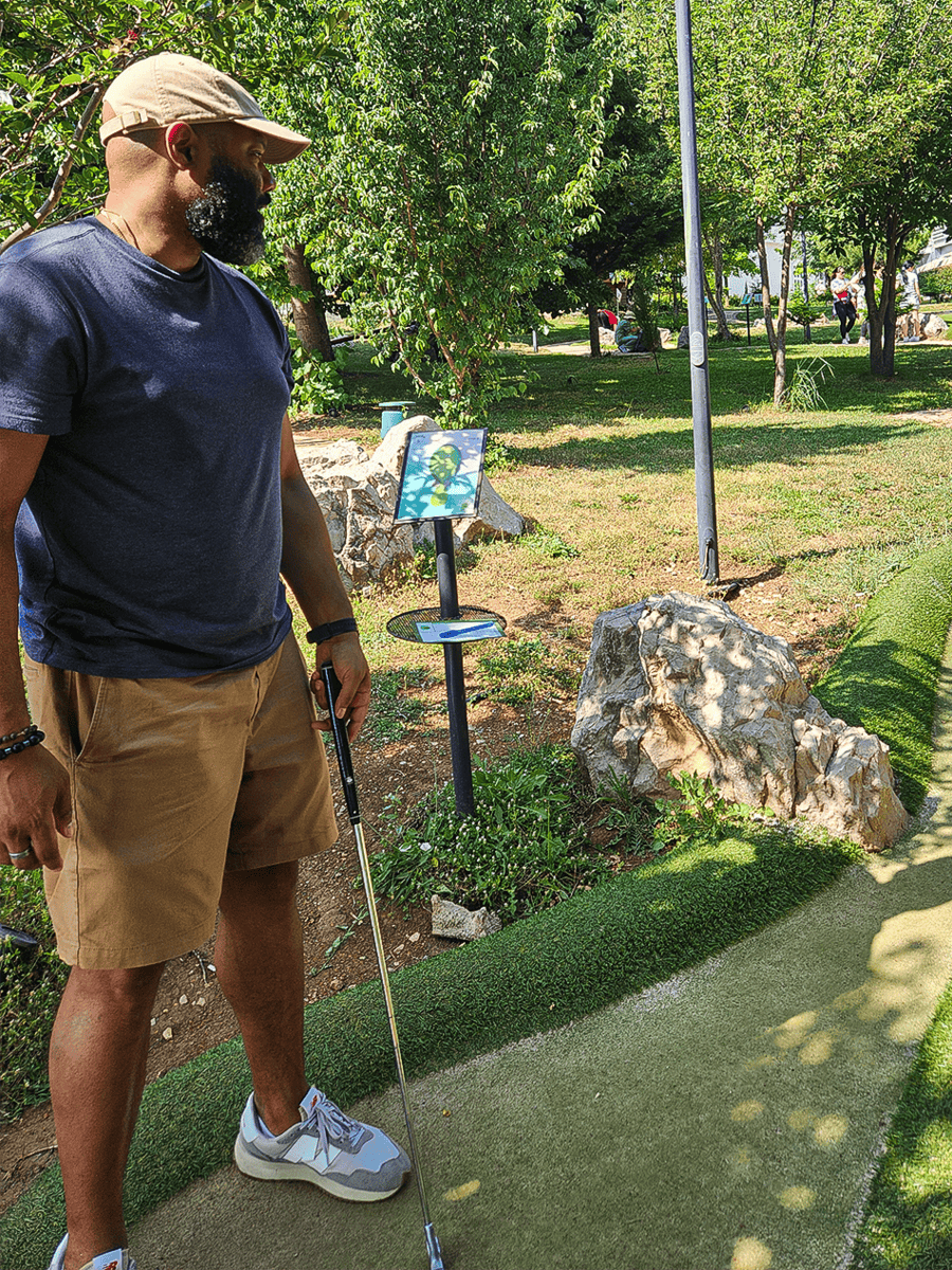 Playing mini golf at Datji National Park in Tirana, Albania
